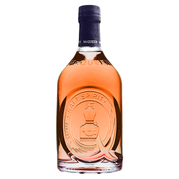 A bottle of McQueen Clementine and Cinnamon